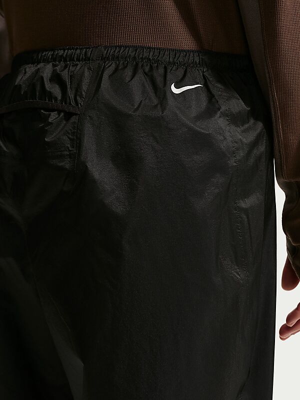 NIKE M NIKE ACG "TRAILWIND" STORM-FIT PANTS på