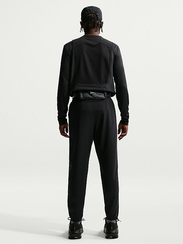 NIKE M NK DF MILER WOVEN PANT på